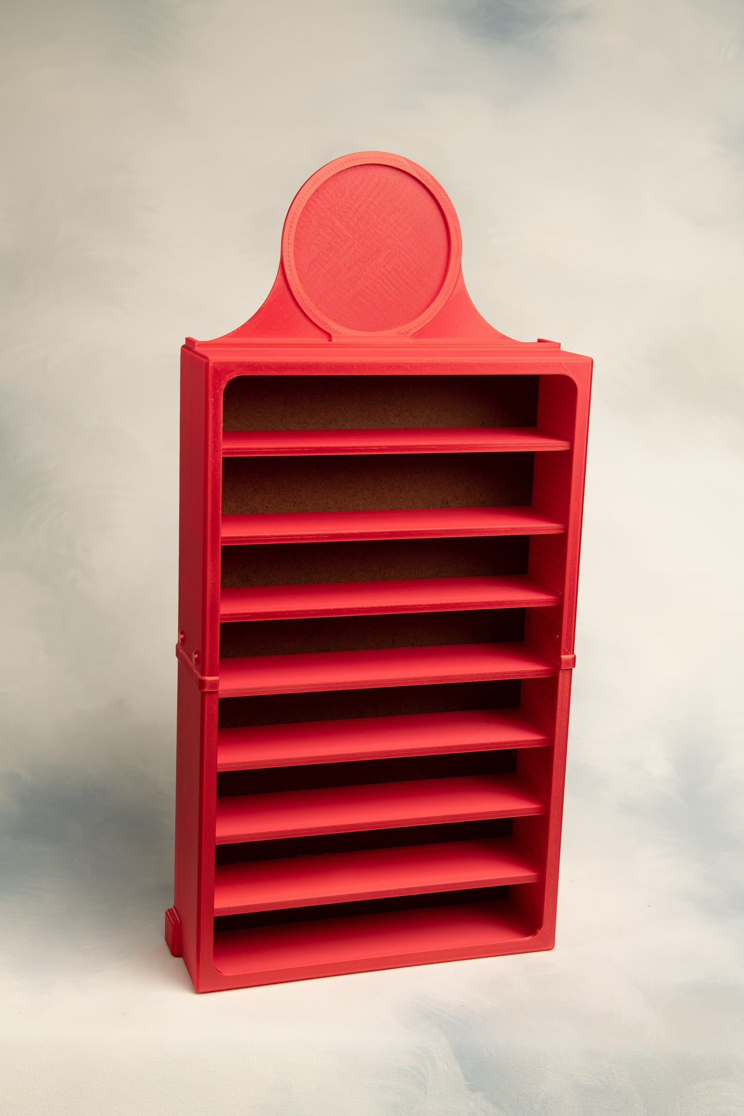 Red 1 belt martial arts display case with a round patch topper a gray background