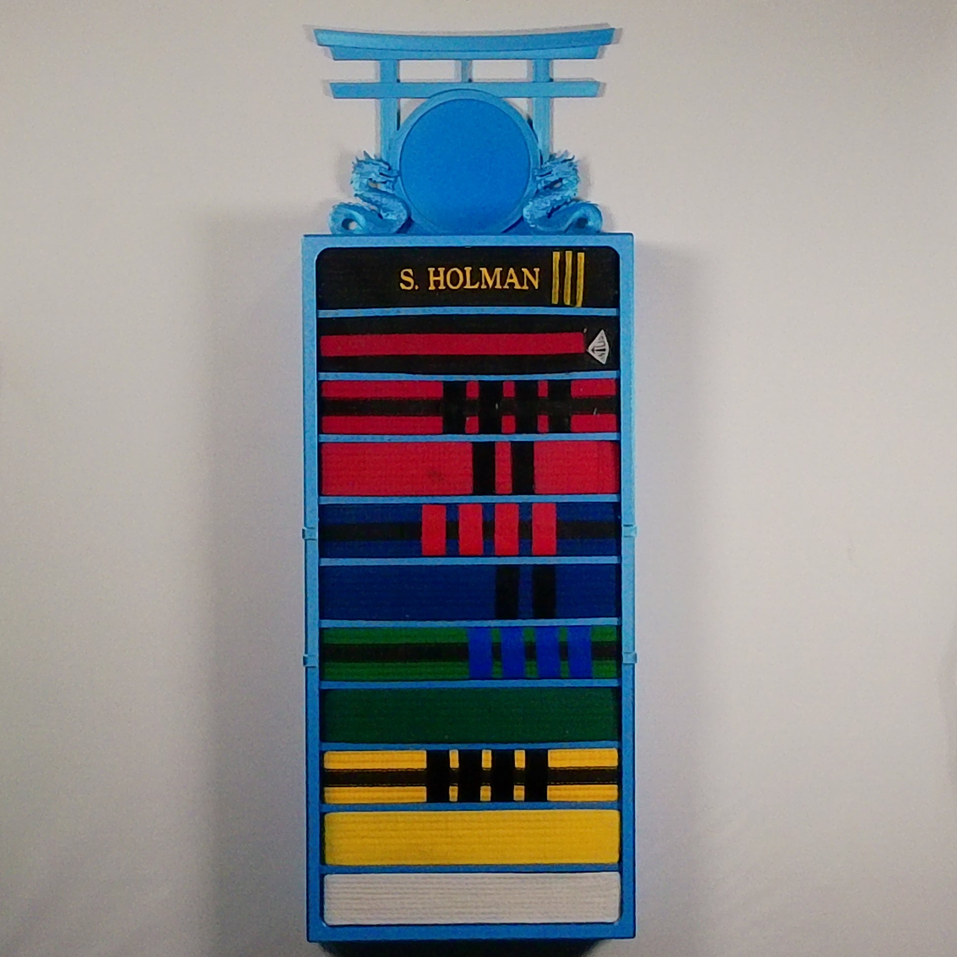 11 belt display case showing premium craftsmanship - blue martial arts belt holder with Dual Dragon topper and belts