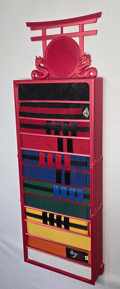 12 belt red wall mounted martial arts display case with belts and upgrade topper on a light gray background