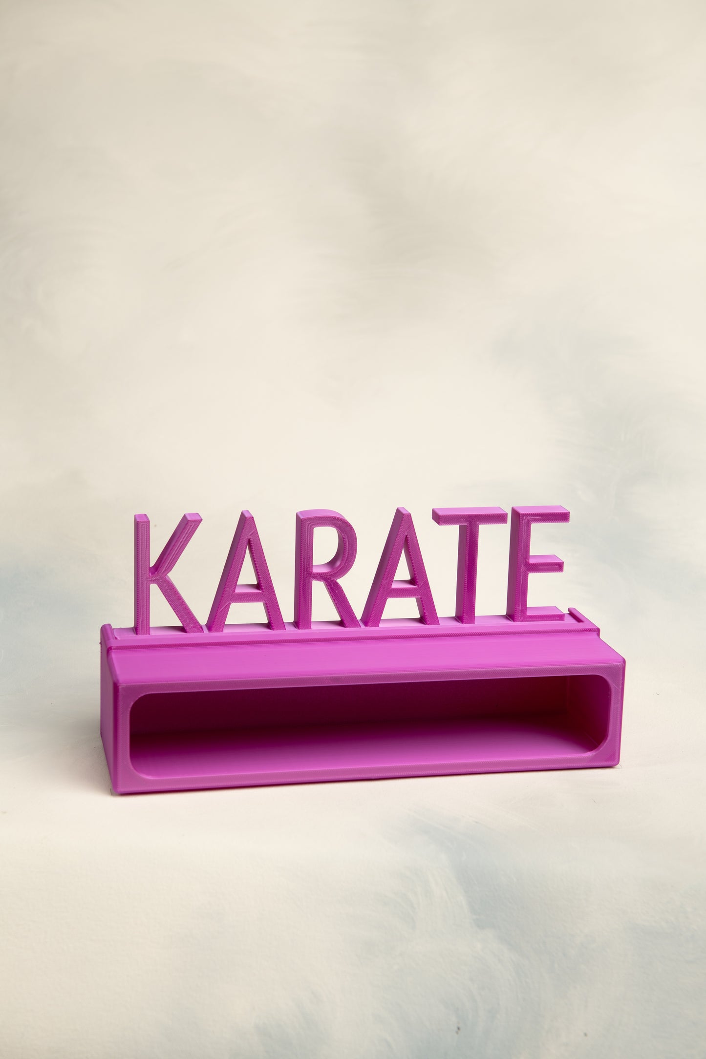 Purple 1 belt display case with a  'KARATE' topper on a light background