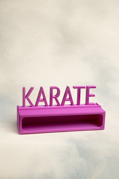 Purple 1 belt display case with a  'KARATE' topper on a light background