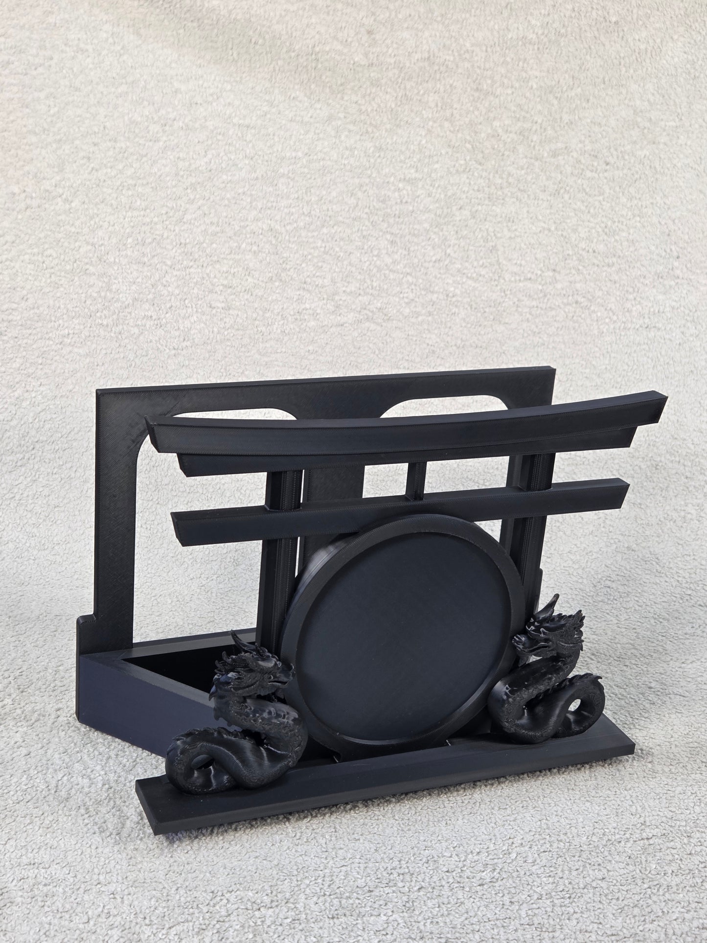 Desktop Martial Arts Display Base - Black color variation. Dual Dragons facing each other set in front of a round patch mounting area and Torii Gate against a white background.
