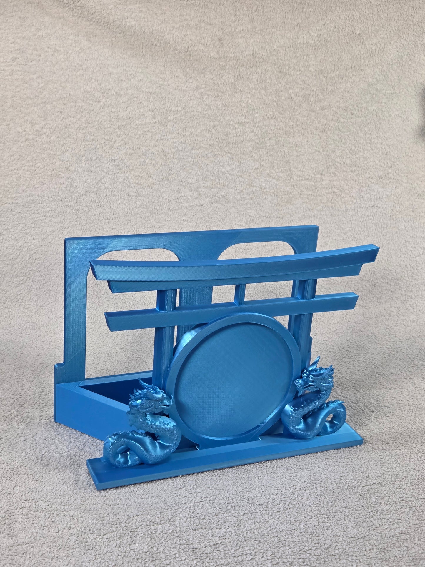 Desktop Martial Arts Display Base - Blue color variation. Dual Dragons facing each other set in front of a round patch mounting area and Torii Gate against a white background.