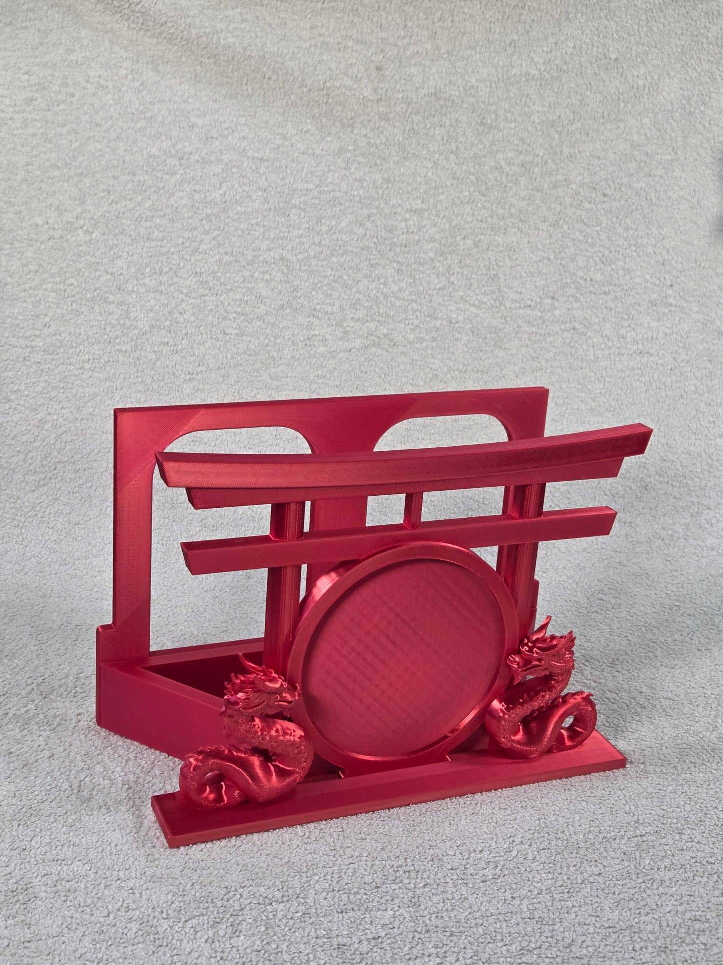 Desktop Martial Arts Display Base - Red color variation. Dual Dragons facing each other set in front of a round patch mounting area and Torii Gate against a white background.