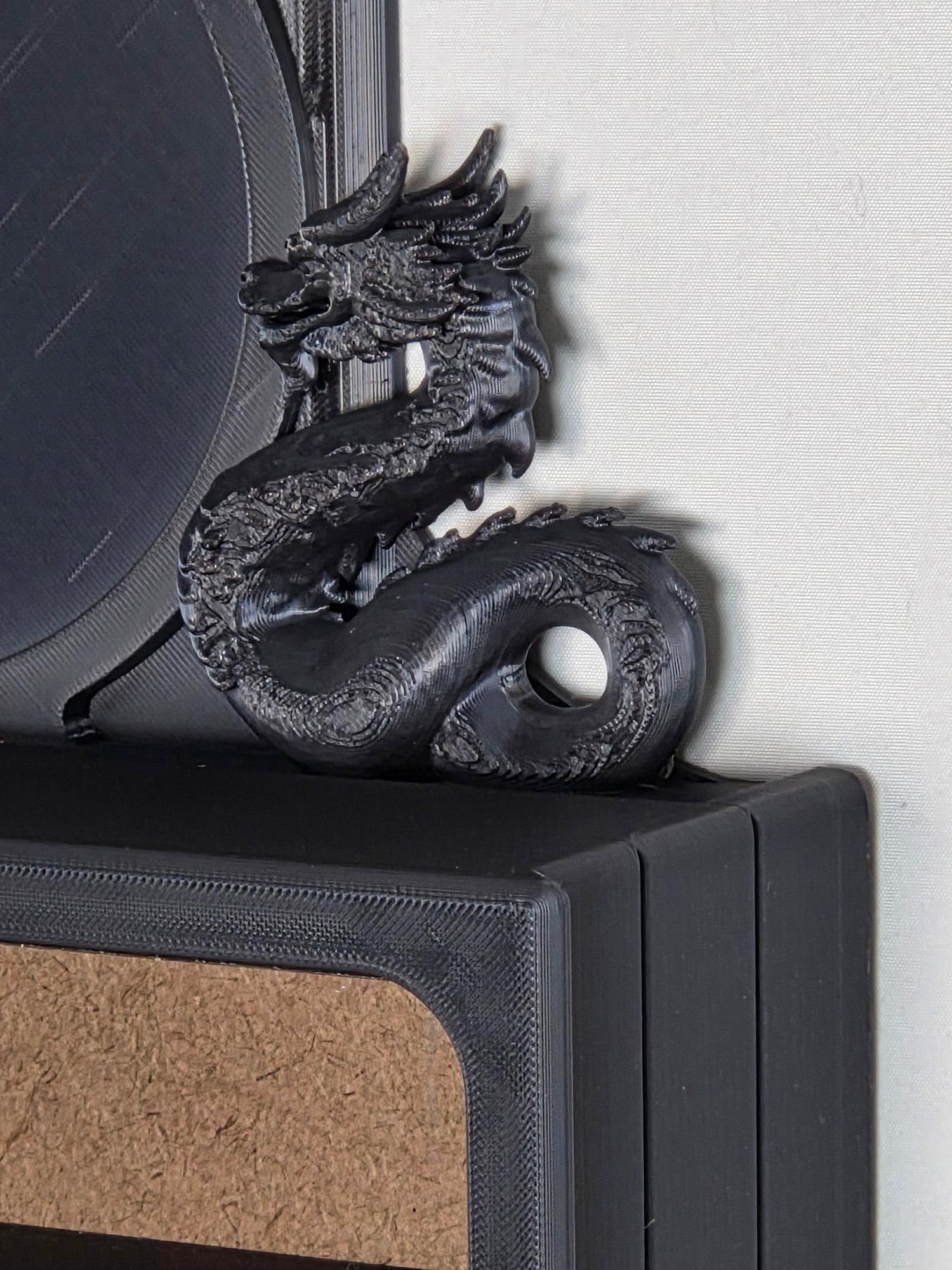 black closeup upper right corner detail and dragon Beltdragon